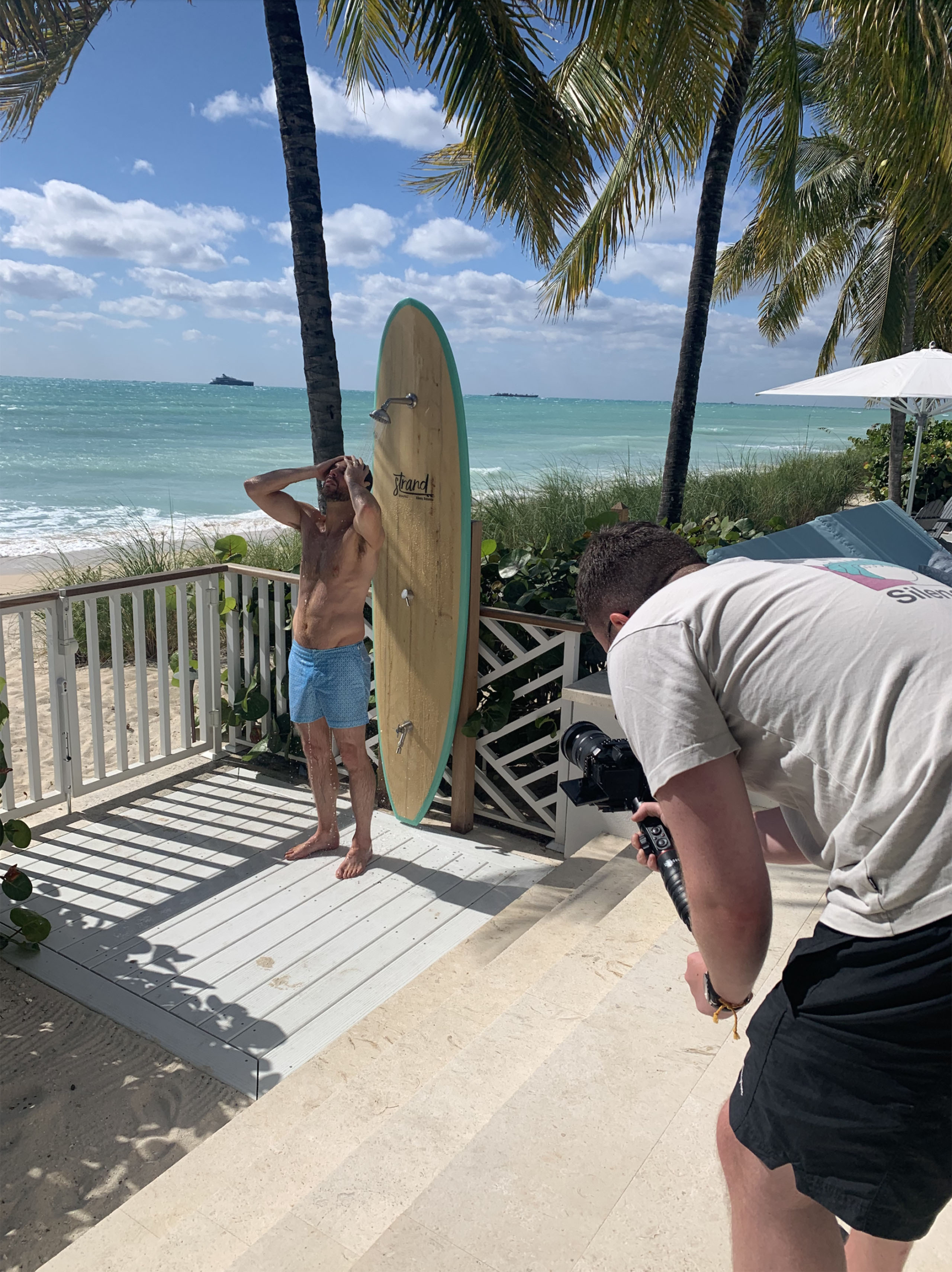Behind the scenes shot of filming shower with model from Lion House Albany, Bahamas film. Beeston Media property and design video production, Bristol video production.