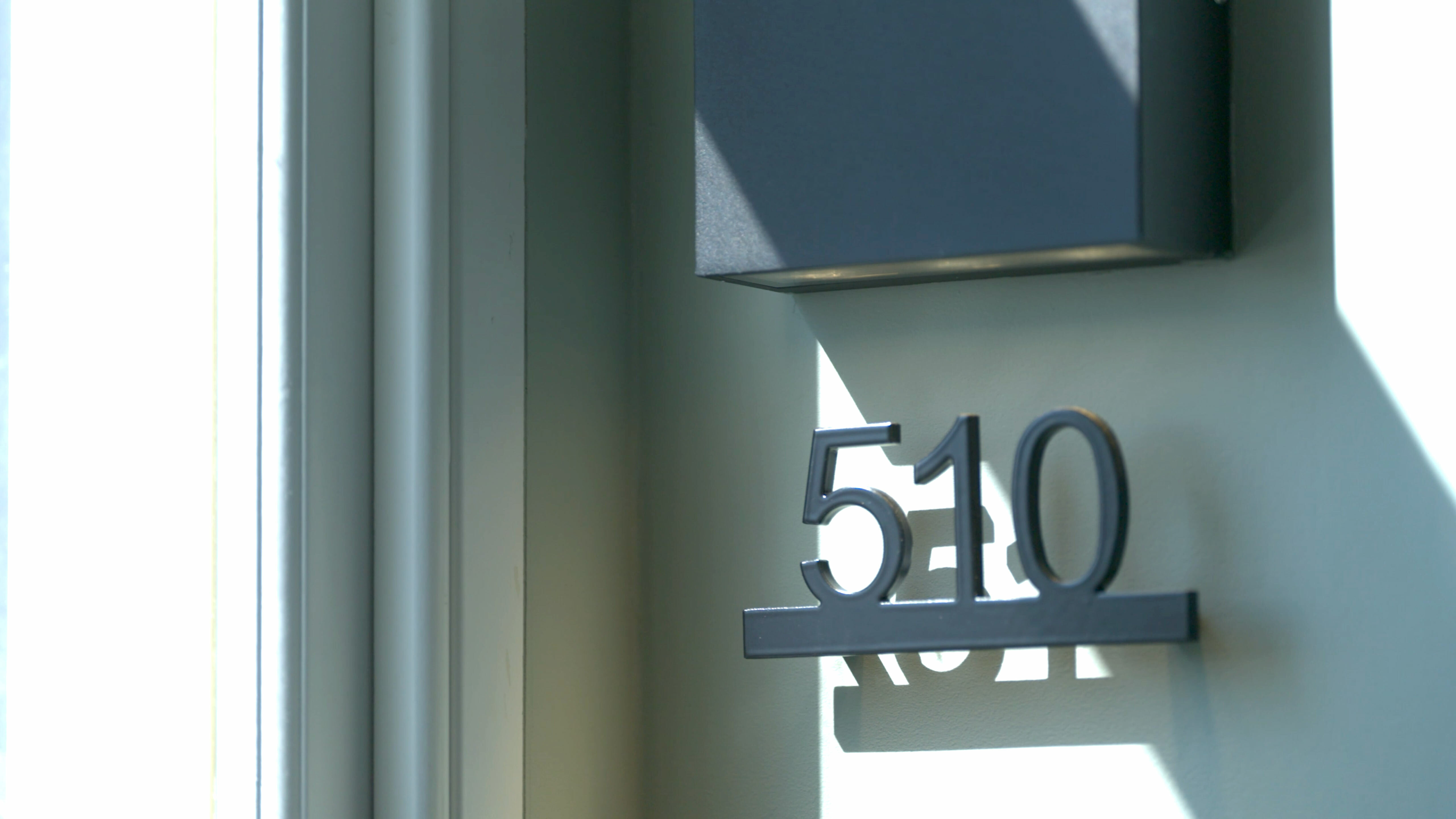 51 London student lettings. Close-up of room number. Beeston Media video production Bristol, property and design video production, luxury property video production, real estate video production.