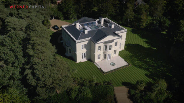Exterior shot of house from film of Camp End Manor, St Georges Hill, Surrey. Beeston Media property and design video production, Bristol video production.