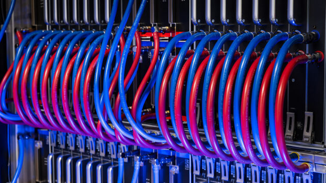Close-up of Isambard-AI supercomputer cooling pipes. Beeston Media video production bristol science and technology video production higher education video production.